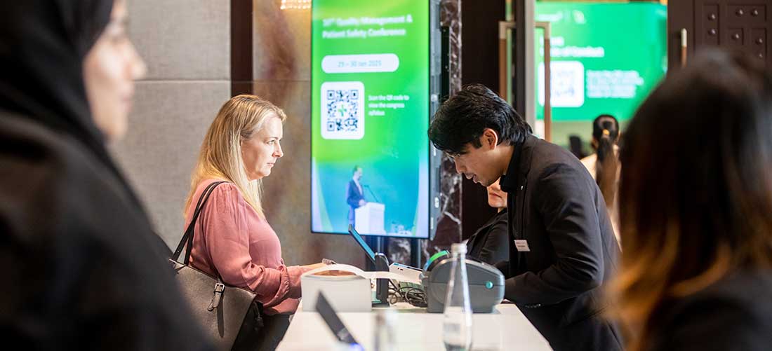WHX Attendees registering for badge at information desk