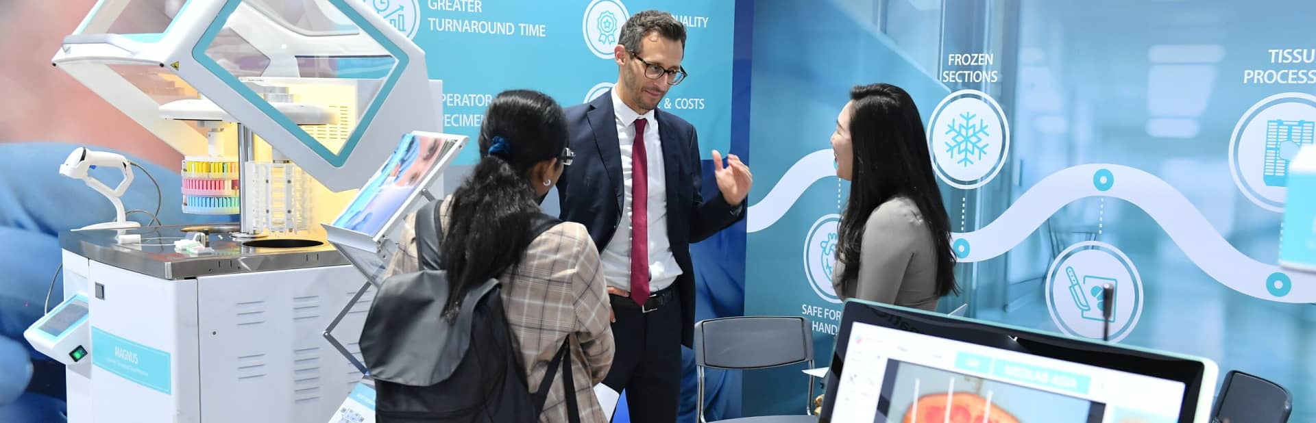 Medical equipment being explained at World Health Expo Labs Kuala Lumpur