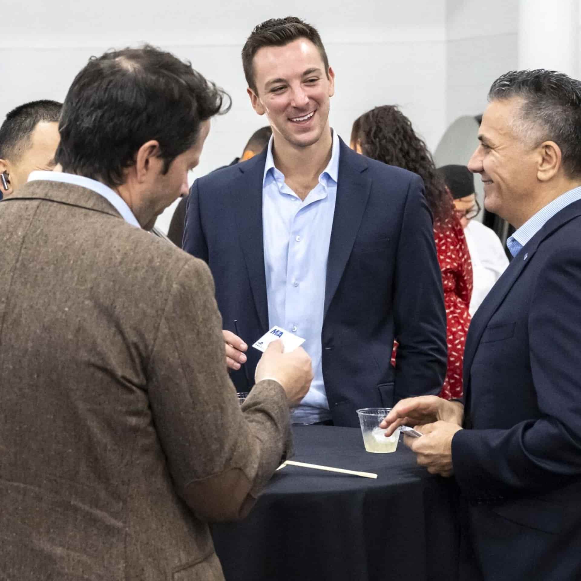 Delegates networking at WHX Miami