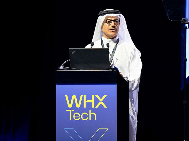 Dr Ameer Al Ameeri addressing the audience on World X stage at WHX Tech 2025